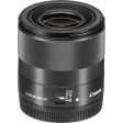 Canon EF-M 32mm f 1.4 STM Lens with 64GB Essential Lens Bundle Supply